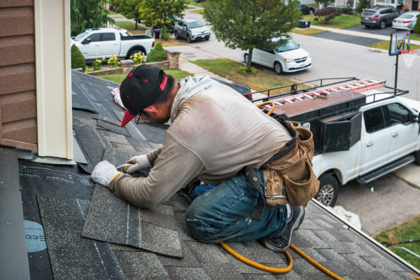 Professional Roofing technician working in Luebbering, MO